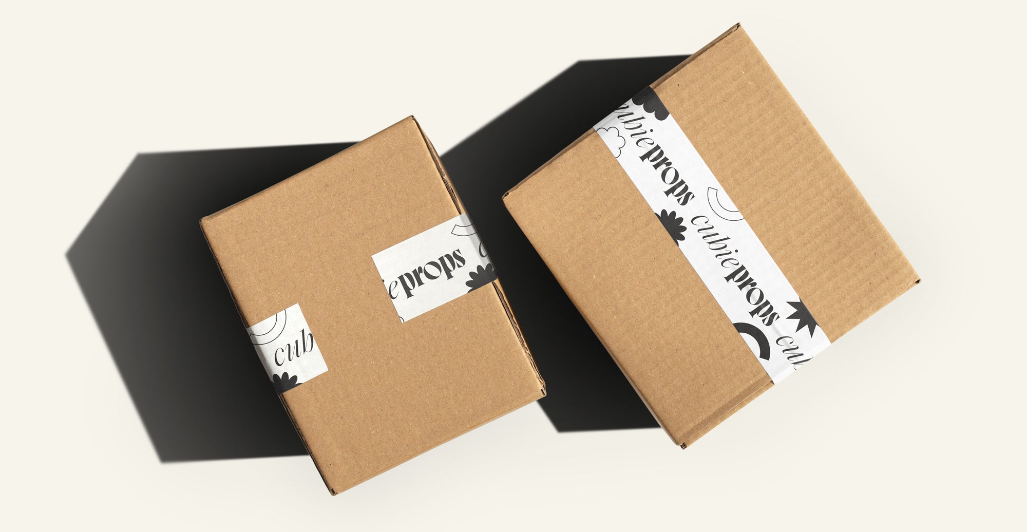 Cubie Props brown packaging boxes with white and black packaging tape
